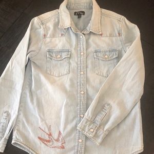 Girls denim long sleeve shirt.